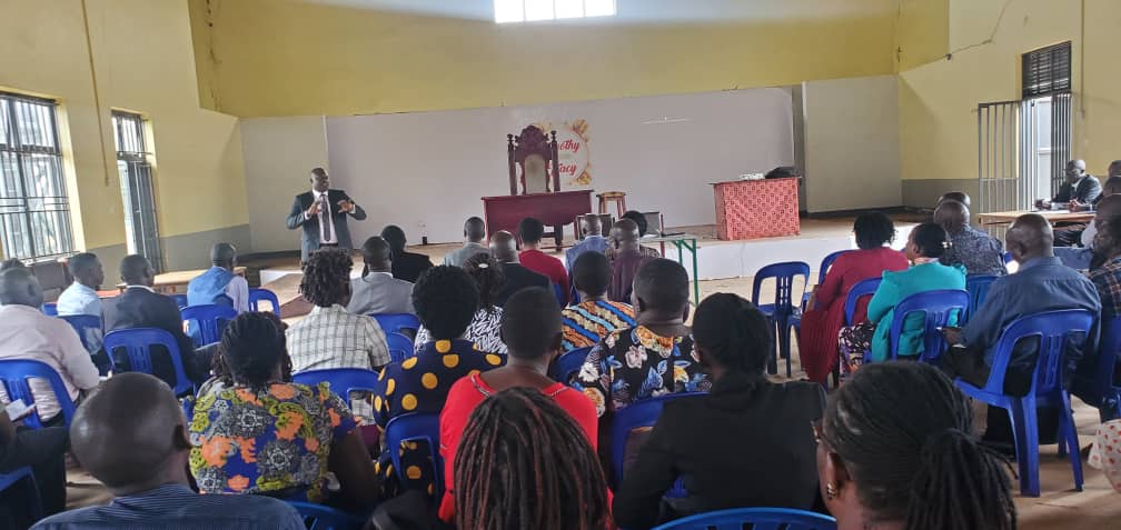 The Chief Administrative Officer - Kamuli, addressing participants at the performance review meeting at the Youth center.