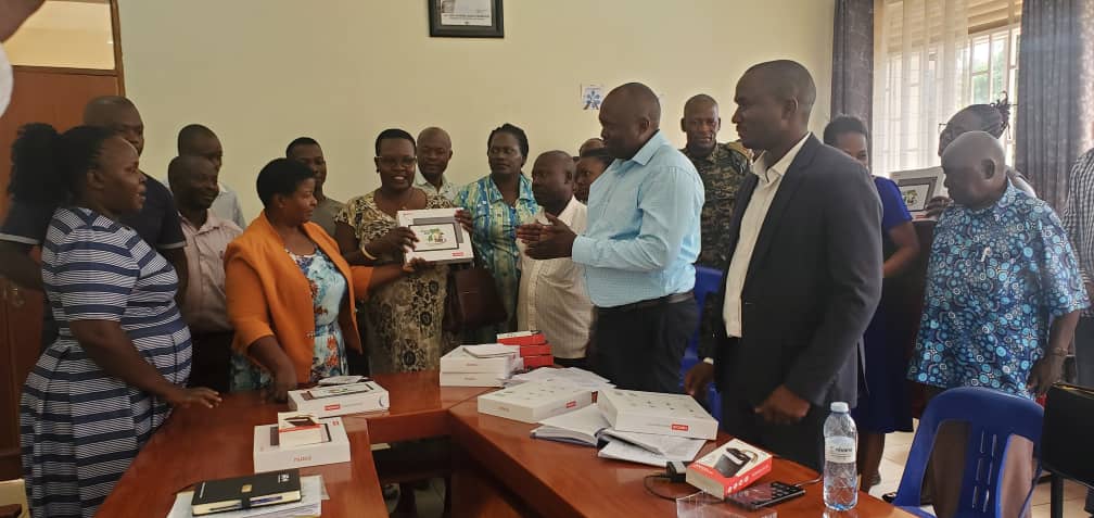 RDC - Kamuli and CAO - Kamuli launching tablets to be used by CDOs, parish chiefs and town agents in various government programs